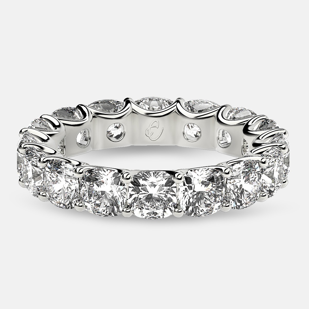 Eternity Ring with Arch Prong Set Cushion Diamonds in Platinum