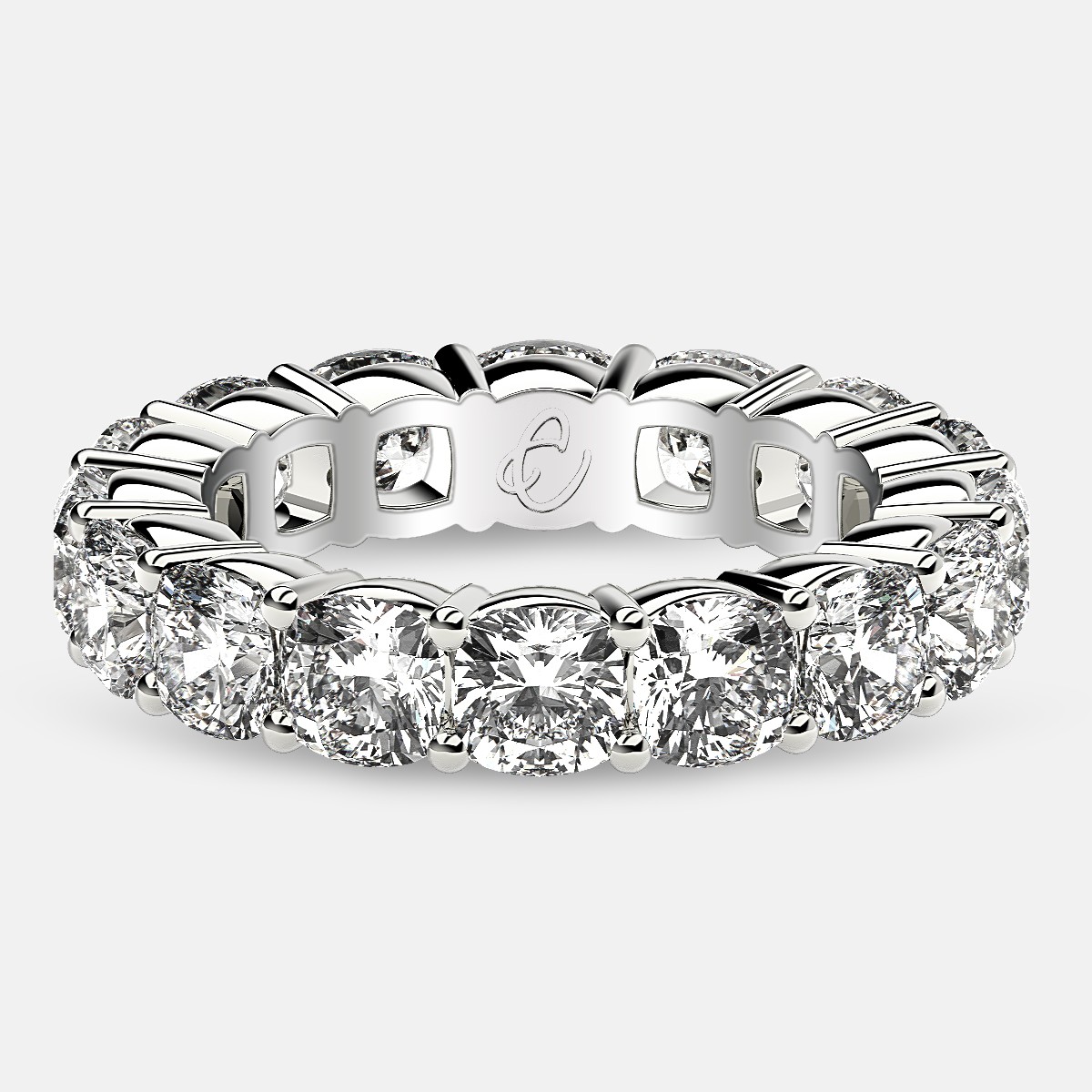 Eternity Ring with Prong Set Cushion Cut Diamonds in Platinum