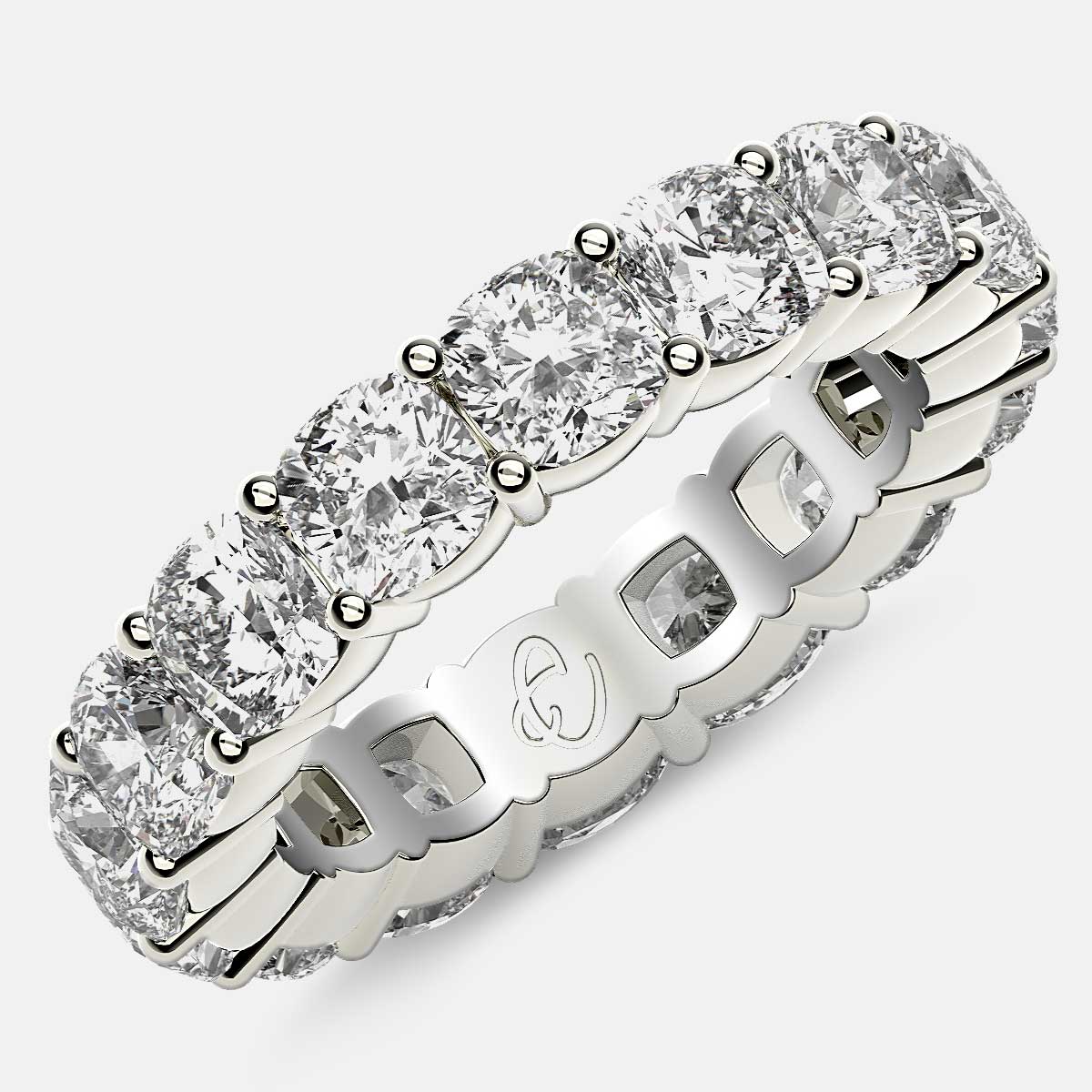 Eternity Ring with Prong Set Cushion Cut Diamonds in Platinum