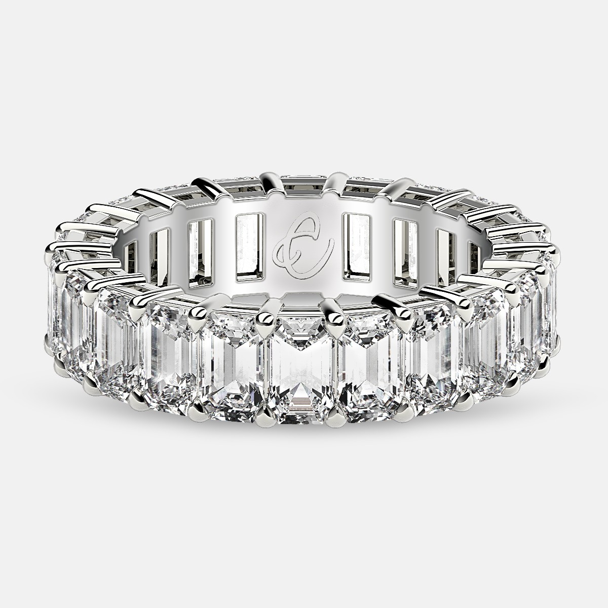 Eternity Ring with Prong Set Emerald Cut Diamonds in Platinum