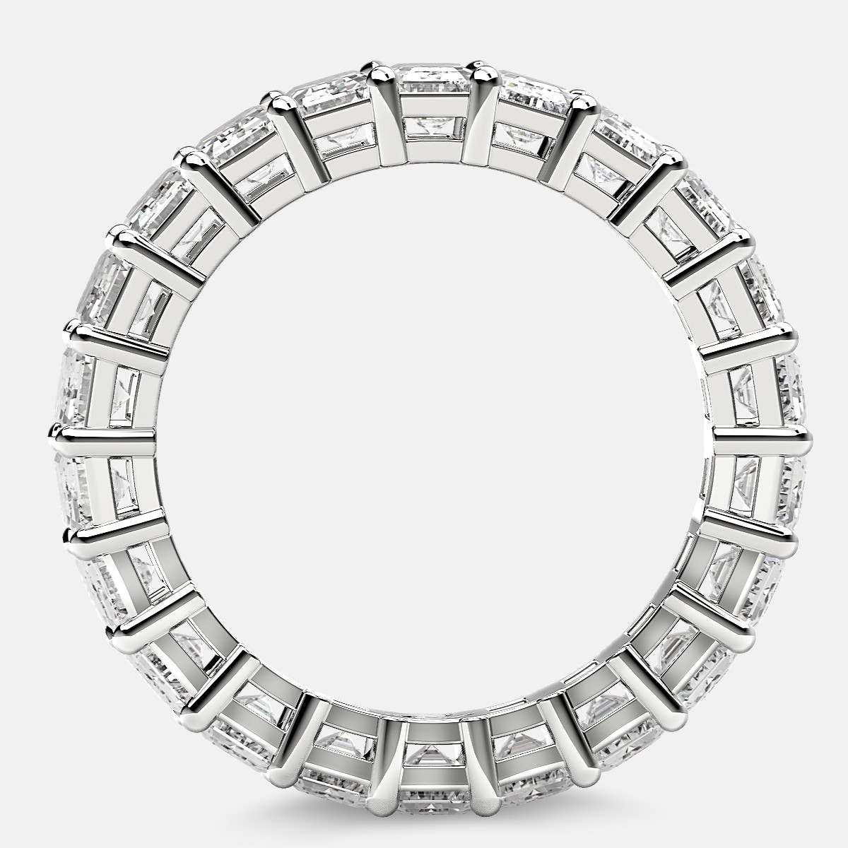 Eternity Ring with Prong Set Emerald Cut Diamonds in Platinum