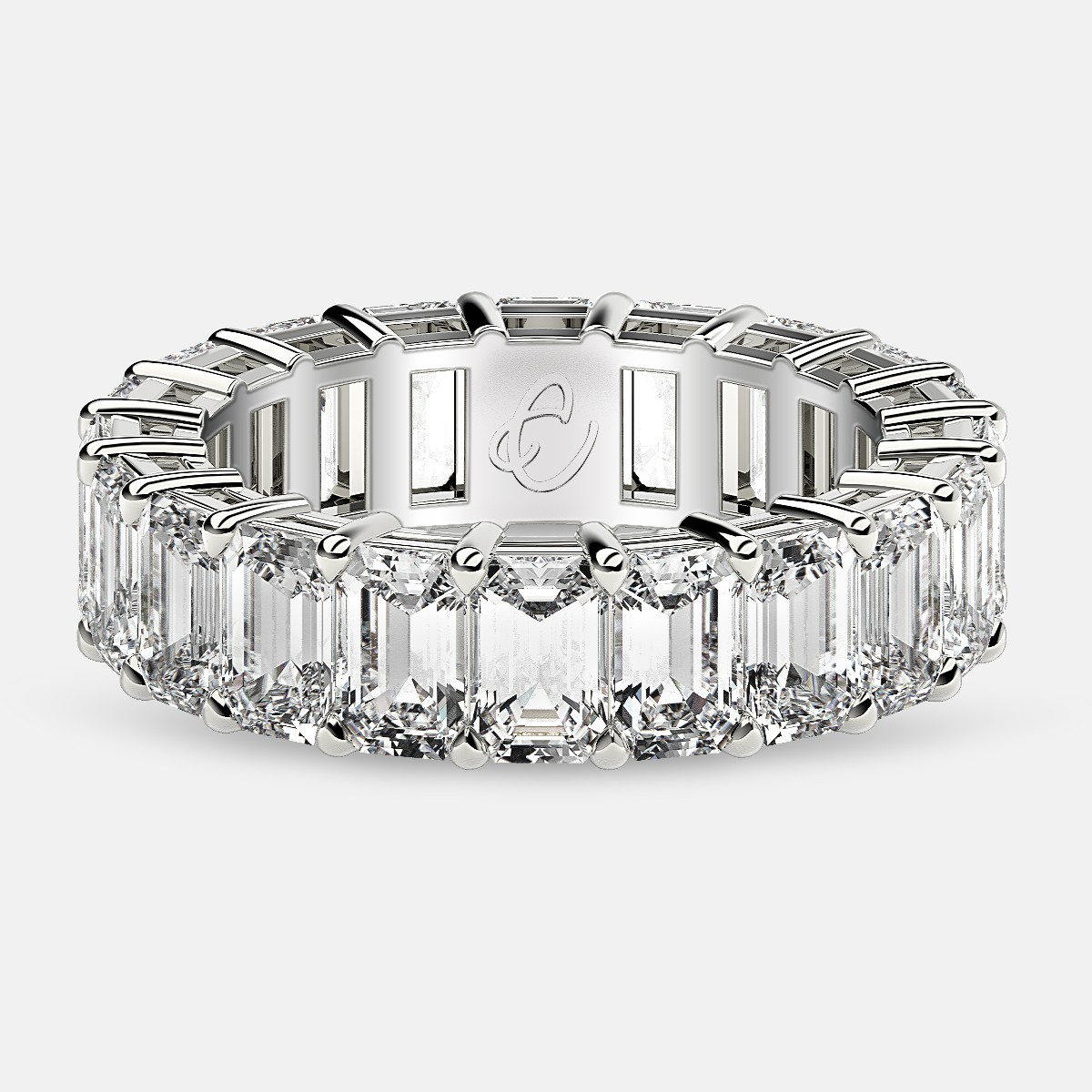 Eternity Ring with Prong Set Emerald Cut Diamonds in Platinum