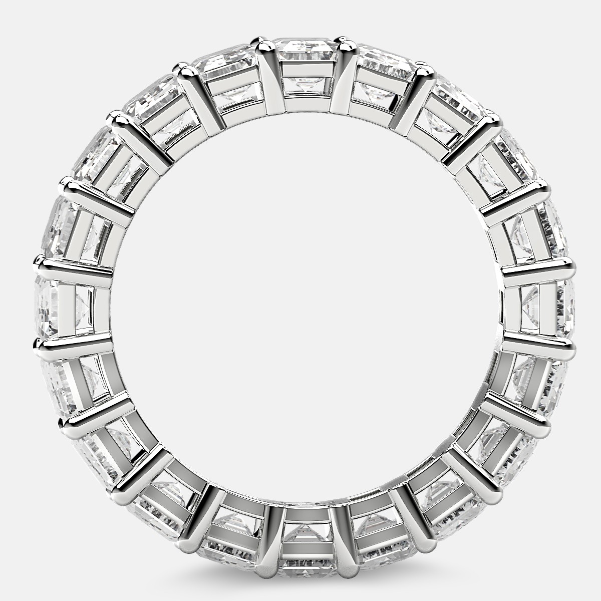 Eternity Ring with Prong Set Emerald Cut Diamonds in Platinum