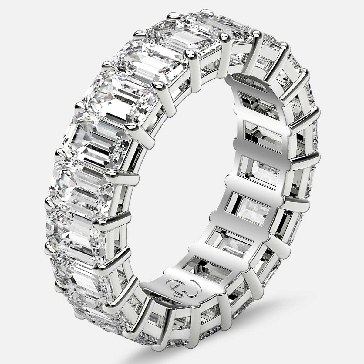 Eternity Ring with Prong Set Emerald Cut Diamonds in Platinum