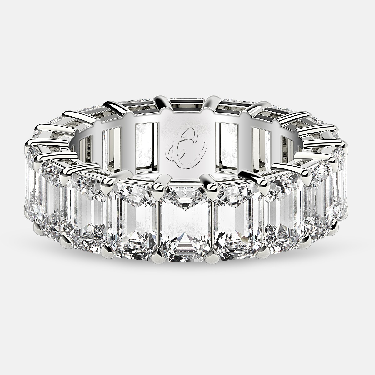 Eternity Ring with Prong Set Emerald Cut Diamonds in Platinum