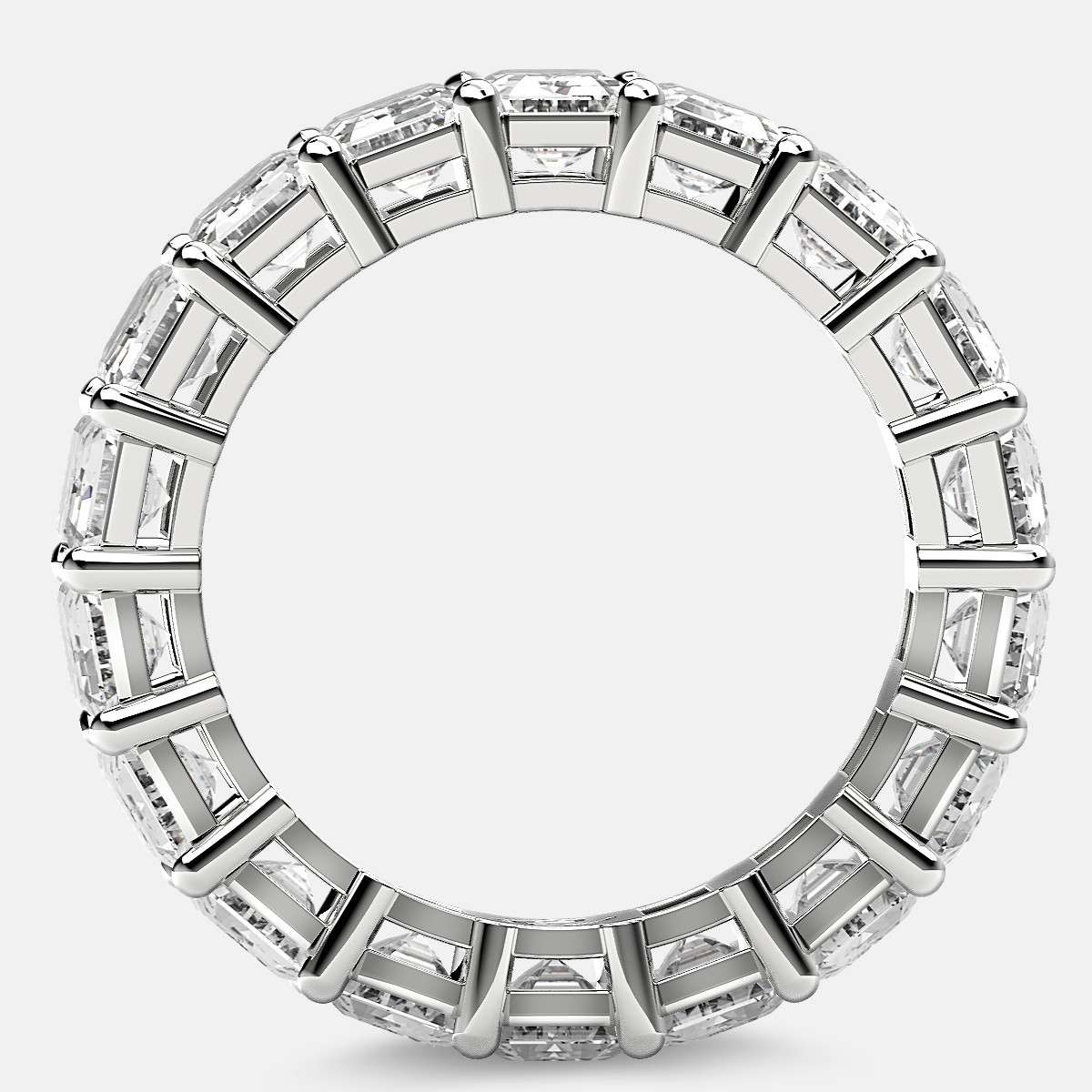 Eternity Ring with Prong Set Emerald Cut Diamonds in Platinum