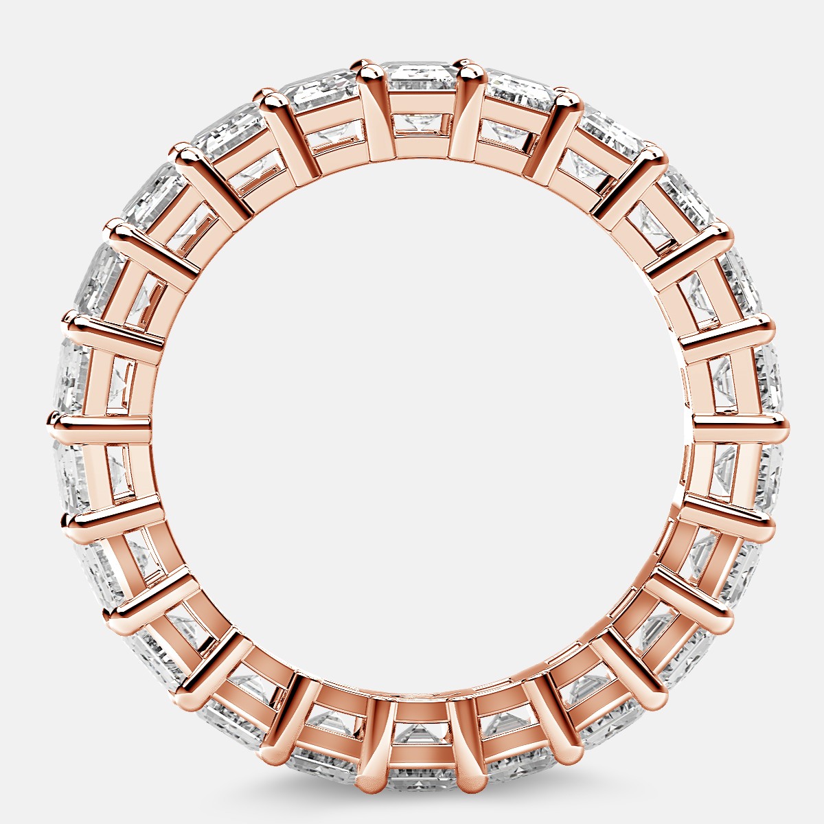 Eternity Ring with Prong Set Emerald Cut Diamonds in 18k Rose Gold