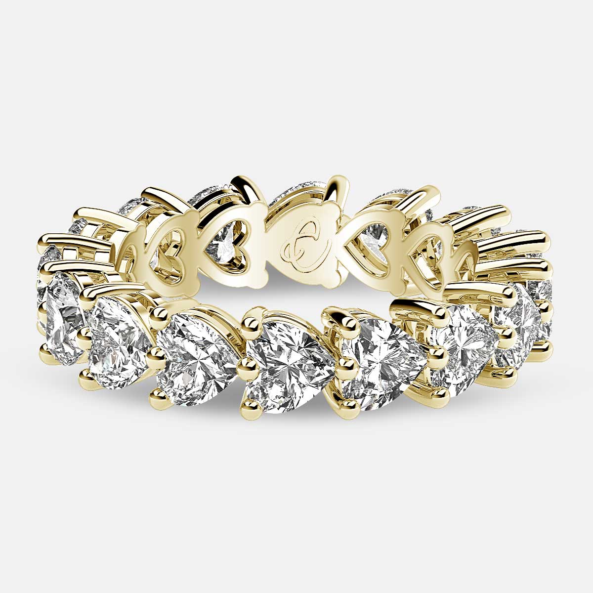 Eternity Ring with Prong Set Heart Shaped Diamonds in 18k Yellow Gold