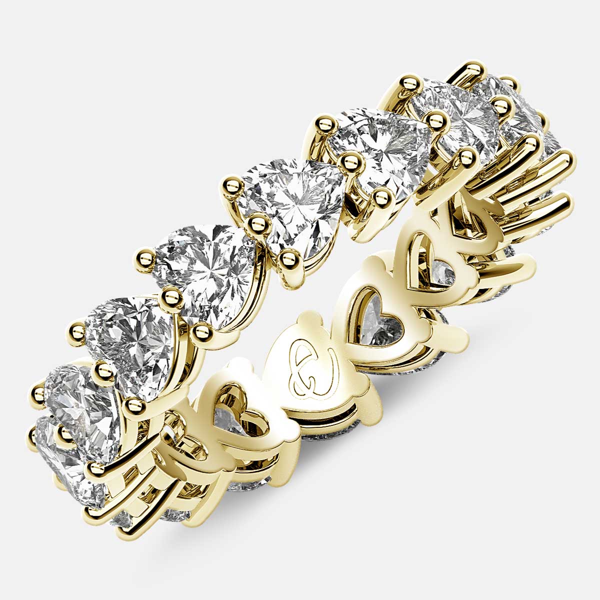 Eternity Ring with Prong Set Heart Shaped Diamonds in 18k Yellow Gold