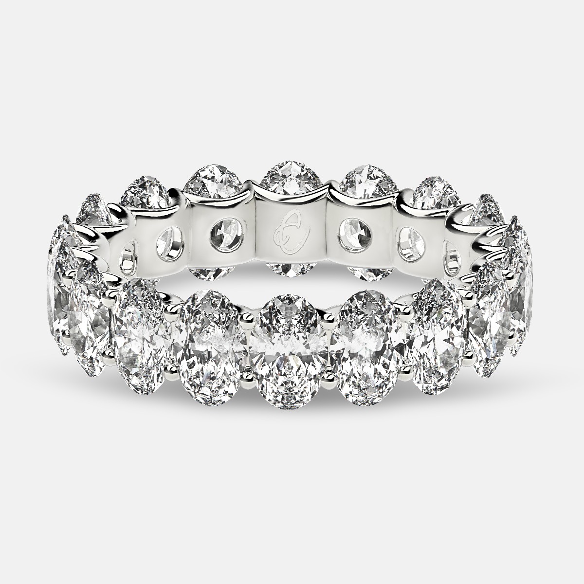 Curved Prong Eternity Ring with Oval Diamonds in Platinum