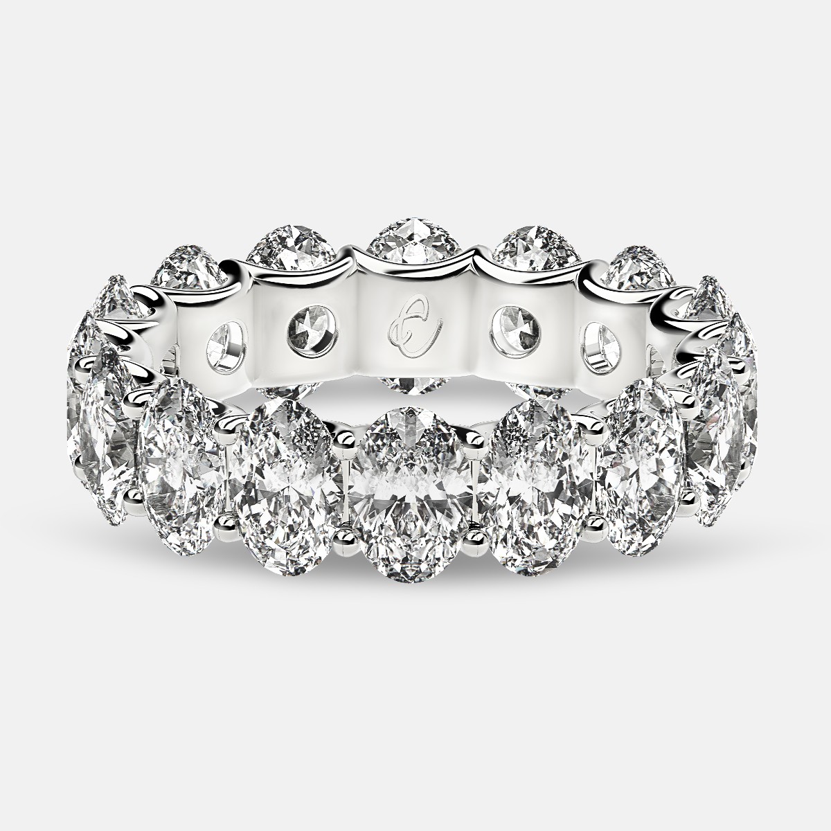 Curved Prong Eternity Ring with Oval Diamonds in Platinum